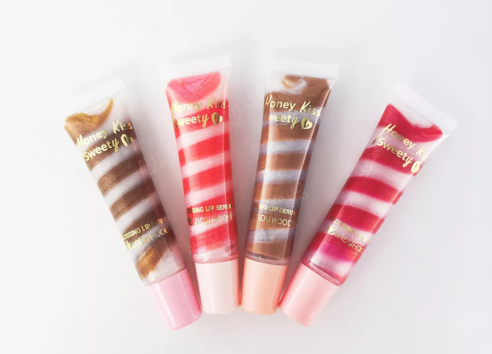 Glossing two color swirled lip serum